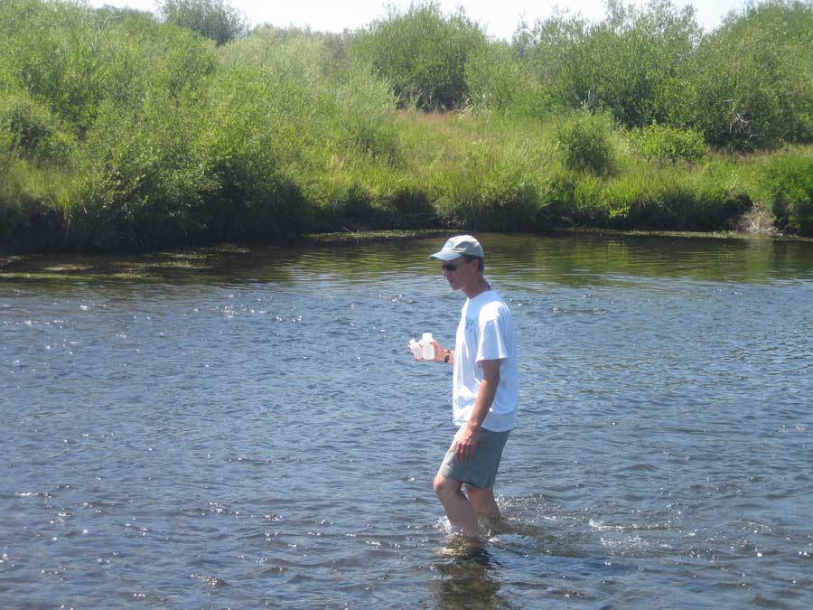 Michael Hochella collecting samples in Montana.