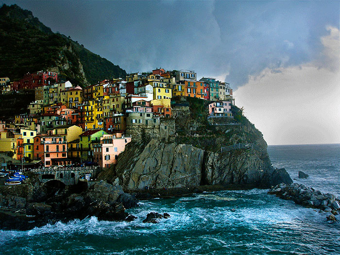 View of Manarola, Cinque Terre, Italy as a hail storm approaches.