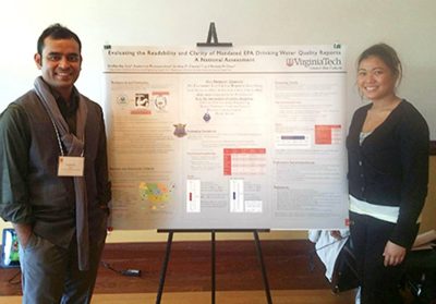 Students presenting at research symposium