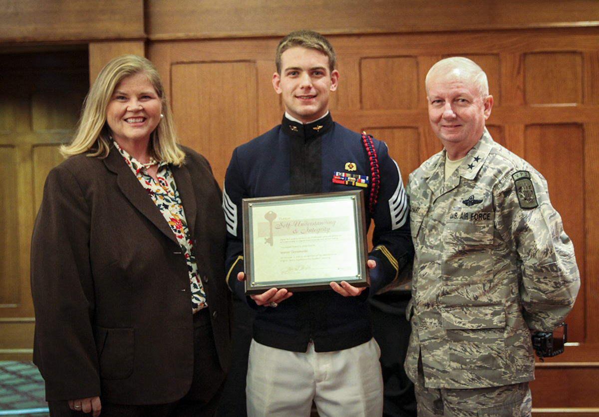 Cadet Walter Gonsiewski poses with Major General Randal Fullhart and Vice President for Student Affairs Patricia A. Perillo at the October Aspire! Awards Breakfast. 