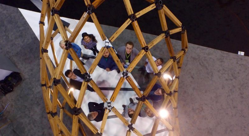 The team from the Center for Design Research at Autodesk University in Las Vegas with their robotically fabricated structure.