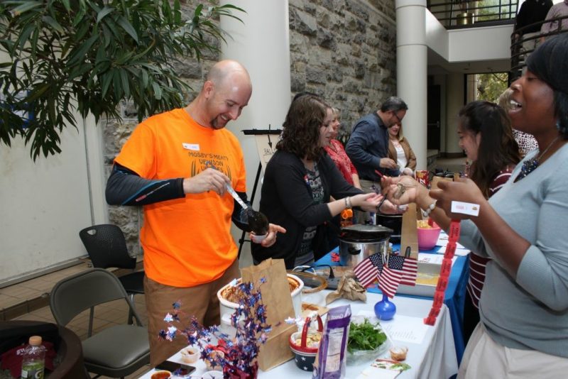 Employees and students enjoy sampling chili during the Pamplin College of Business Chili Cook Off.